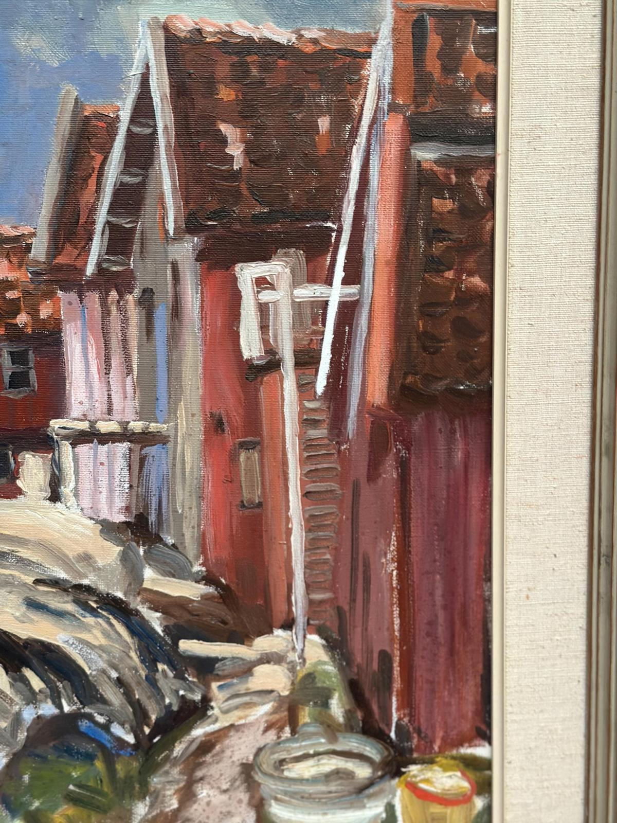 “Red Cottages by Coast”