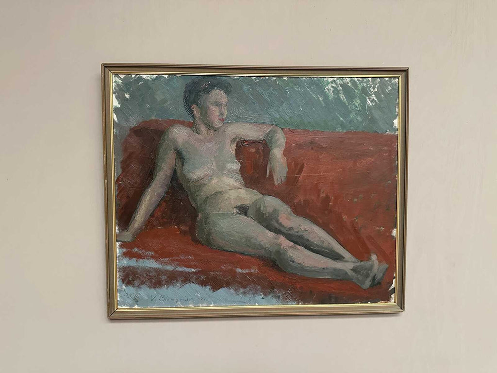 “Reclining Lady on Red Couch” by Vilhelm Blomquist