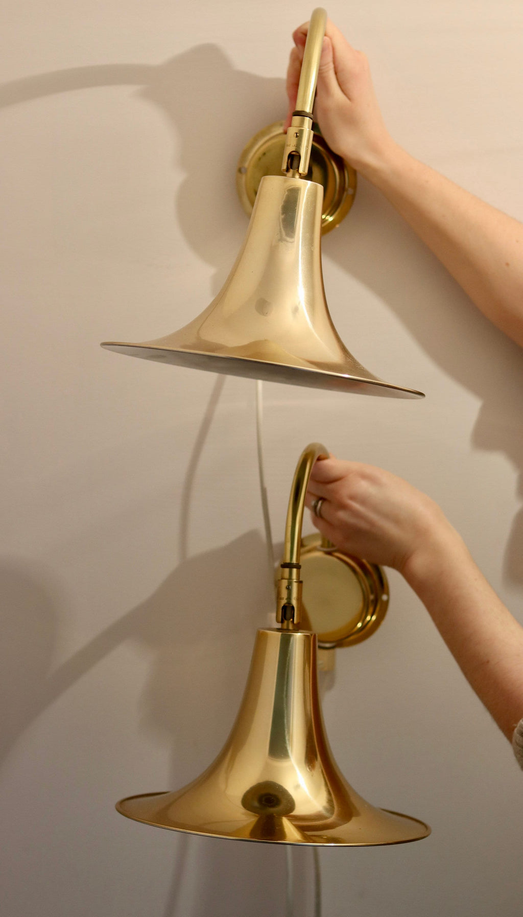 1960's Pair of Statement Trump Shape Lights in Brass, designed by Börje Claes for Norlett Elit. Noah Ancienne