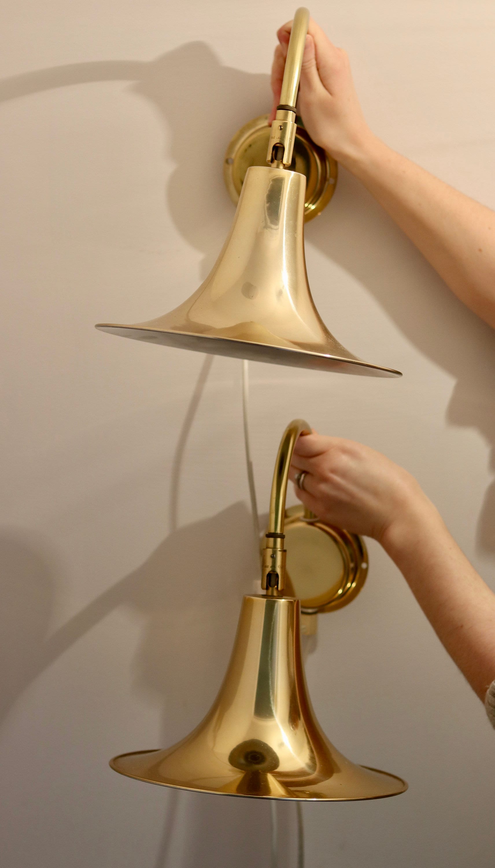 1960's Pair of Statement Trump Shape Lights in Brass, designed by Börje Claes for Norlett Elit. Noah Ancienne