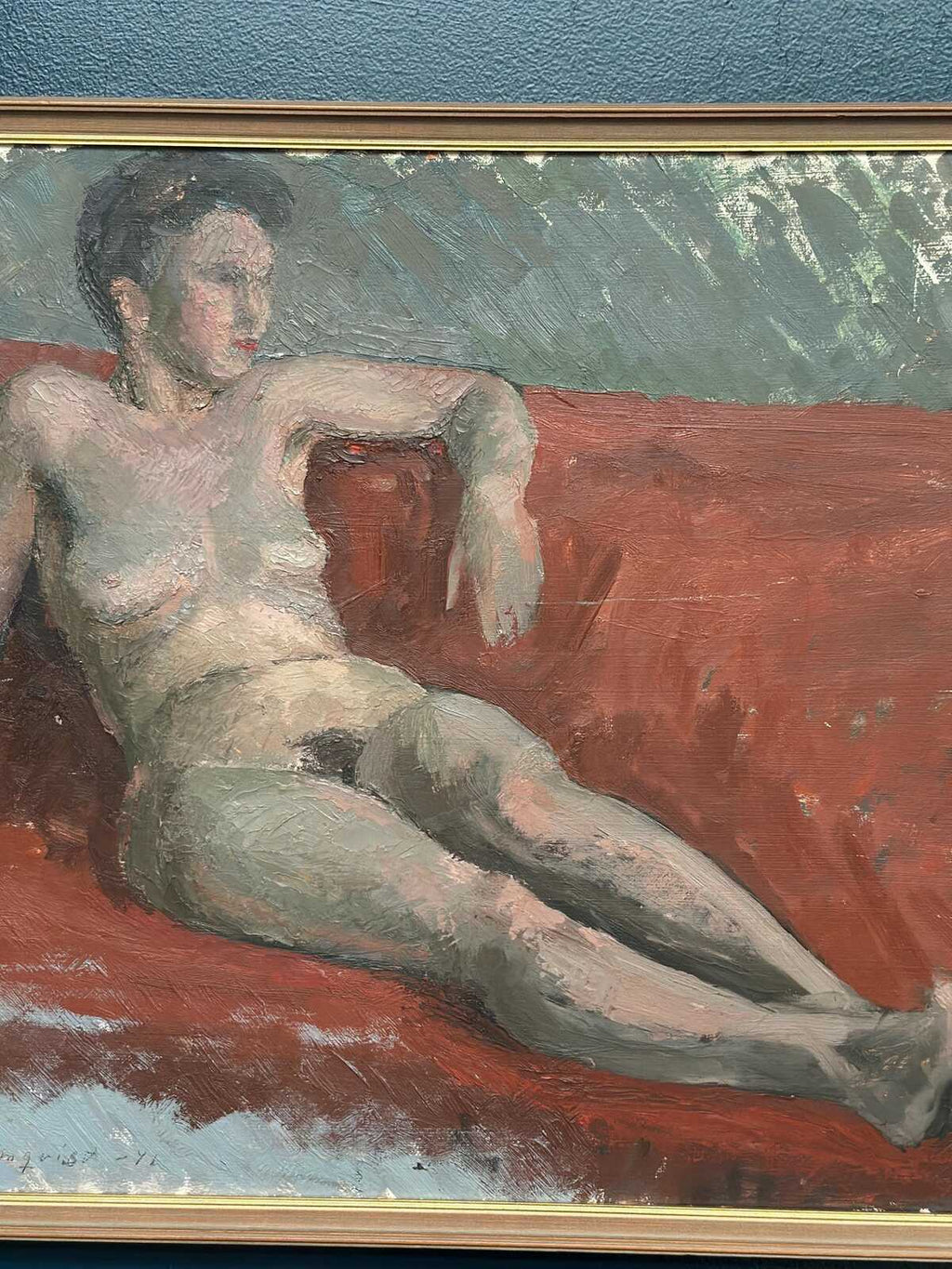 “Reclining Lady on Red Couch” by Vilhelm Blomquist