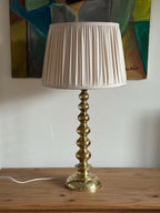 Tall Swedish Brass Bobbin lamps by Aneta