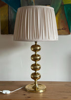 Tall Swedish Brass Bobbin lamps by Aneta
