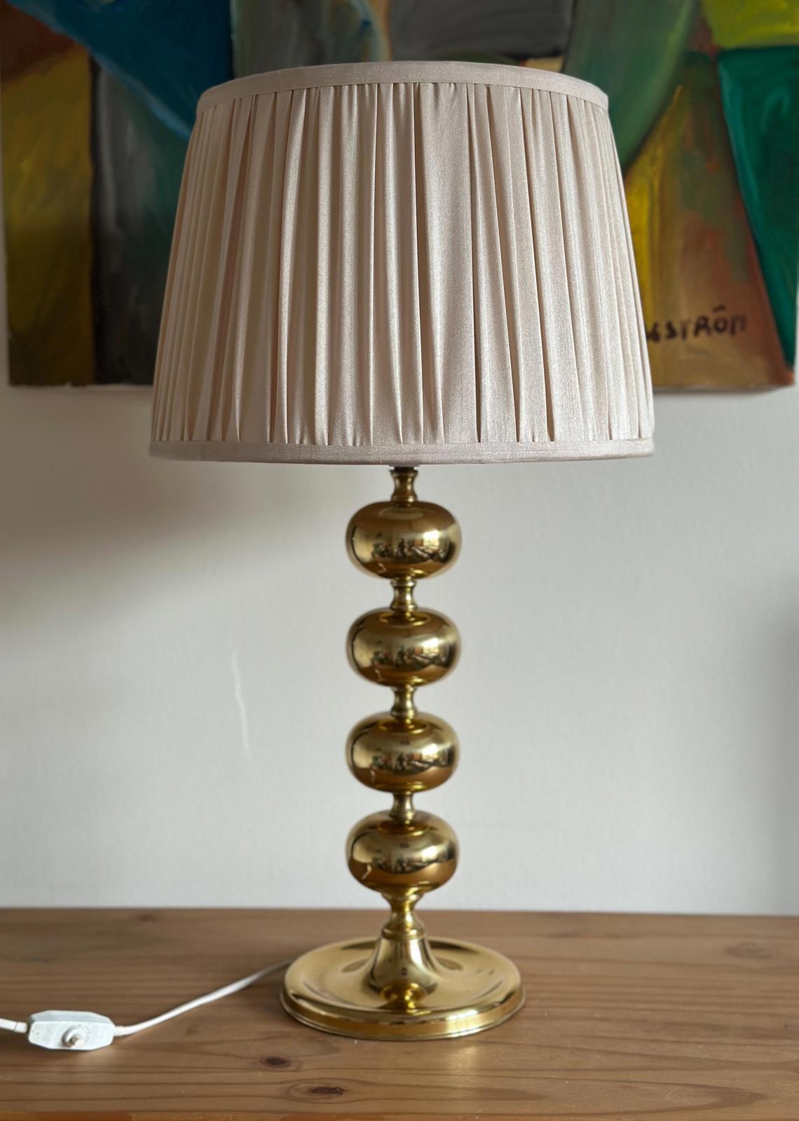 Tall Swedish Brass Bobbin lamps by Aneta