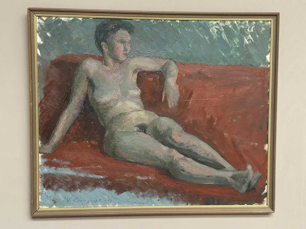 “Reclining Lady on Red Couch” by Vilhelm Blomquist