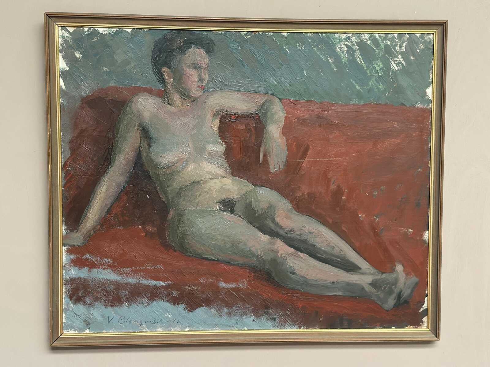 “Reclining Lady on Red Couch” by Vilhelm Blomquist