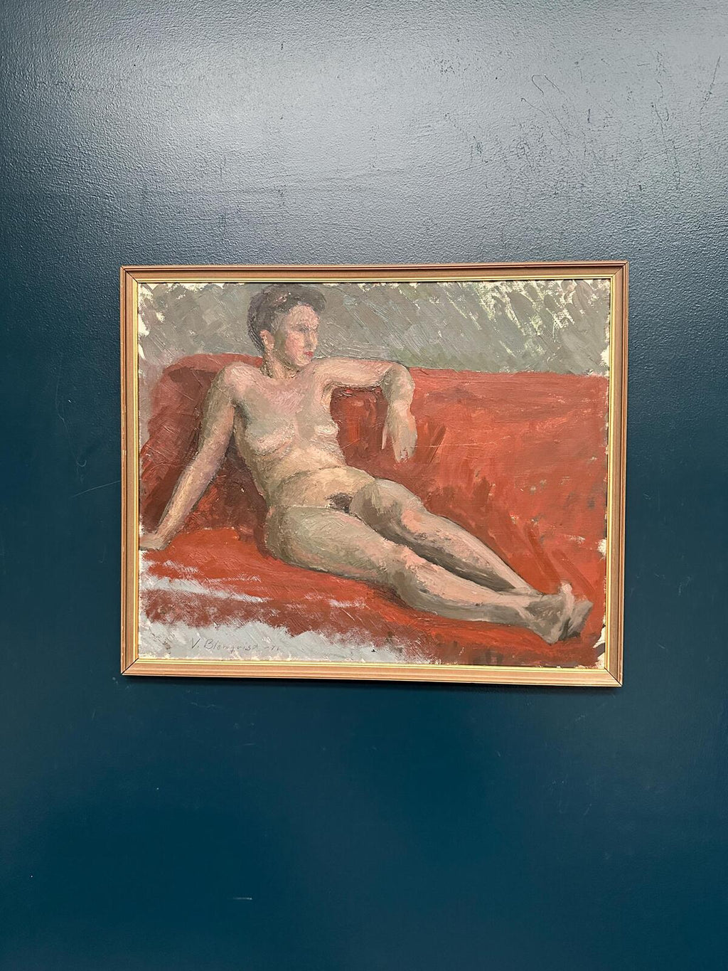 “Reclining Lady on Red Couch” by Vilhelm Blomquist