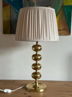 Tall Swedish Brass Bobbin lamps by Aneta
