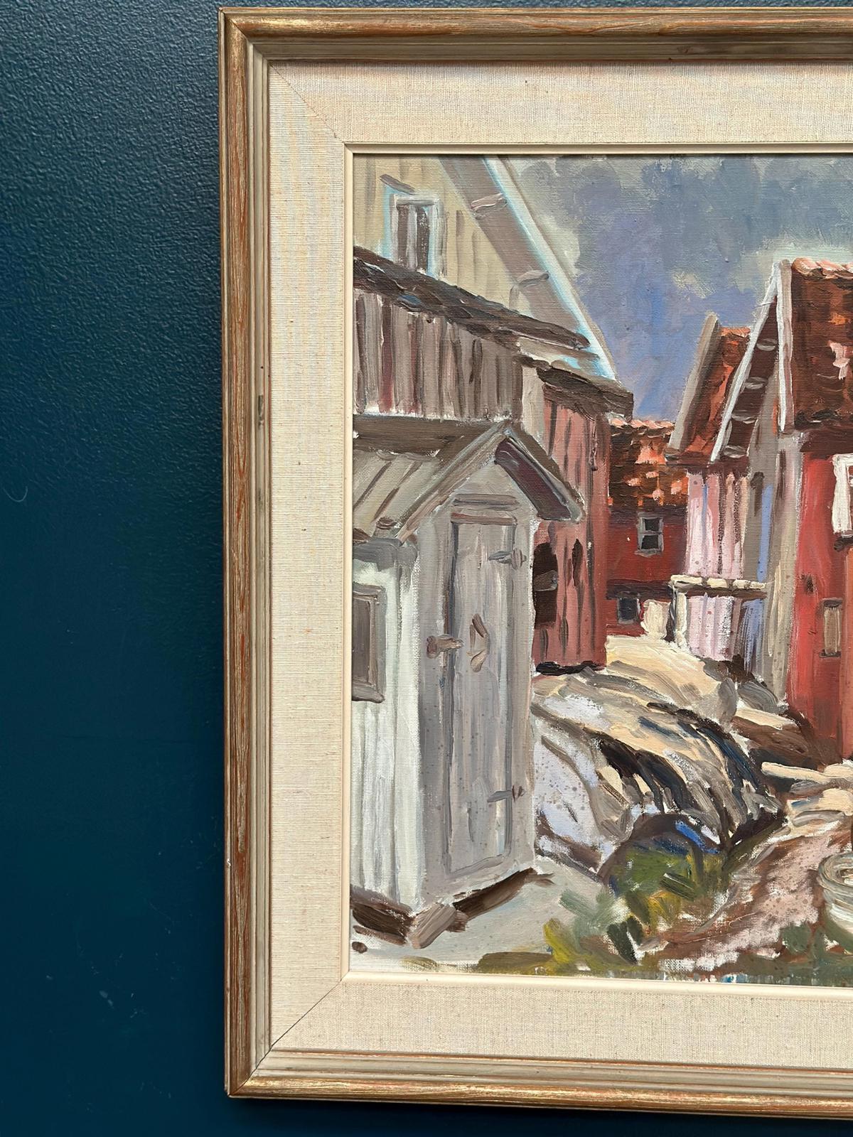 “Red Cottages by Coast”