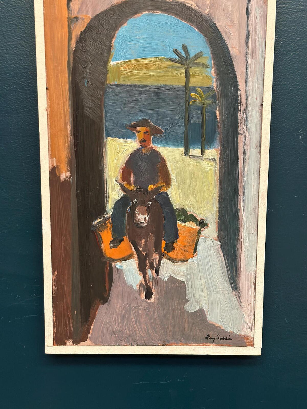 “Man Riding a Donkey” by Harry Sahlin