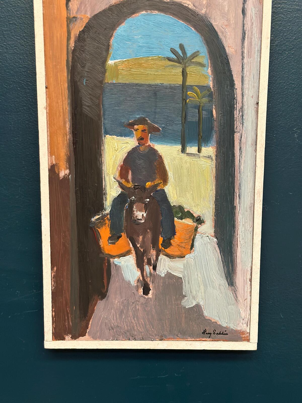 “Man Riding a Donkey” by Harry Sahlin