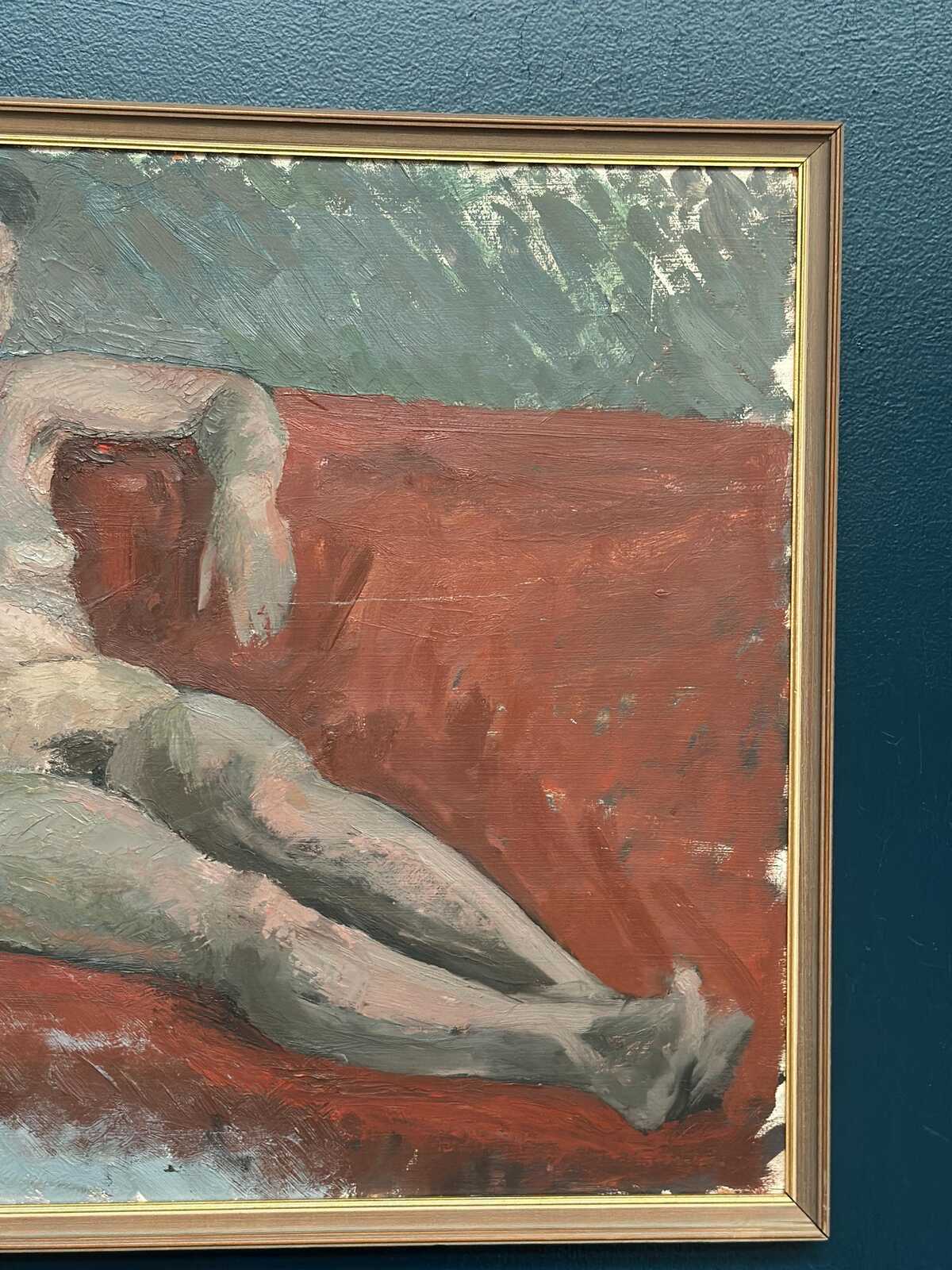 “Reclining Lady on Red Couch” by Vilhelm Blomquist
