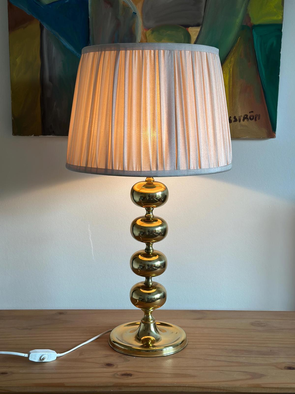Tall Swedish Brass Bobbin lamps by Aneta