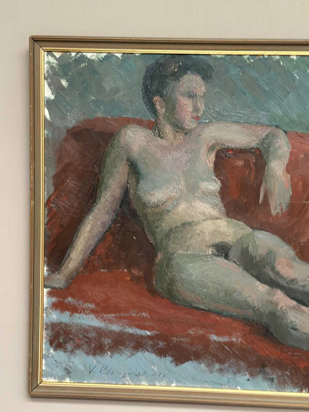 “Reclining Lady on Red Couch” by Vilhelm Blomquist