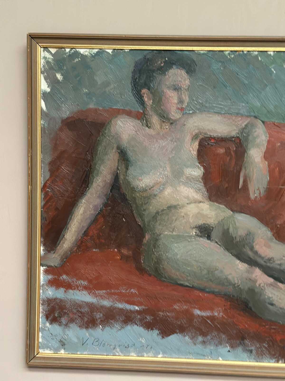 “Reclining Lady on Red Couch” by Vilhelm Blomquist