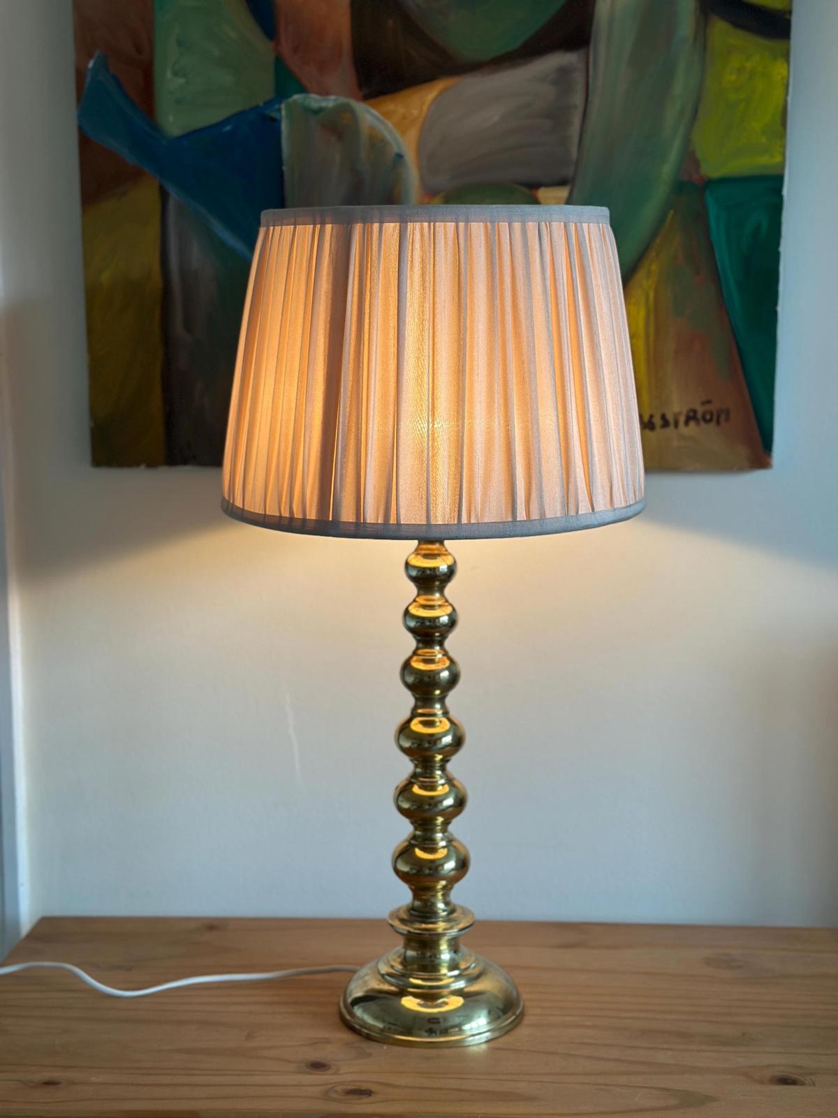 Tall Swedish Brass Bobbin lamps by Aneta