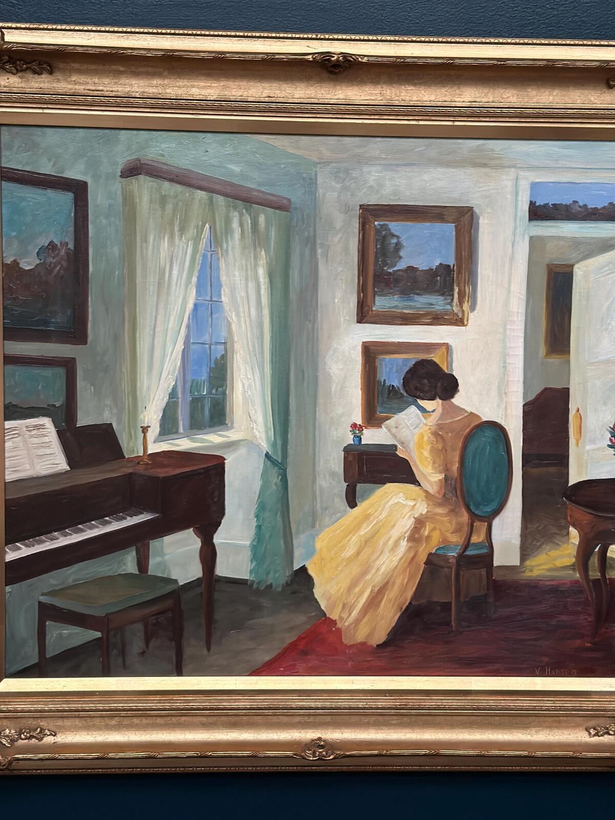 “Interior with Reading Woman” by V. Hansen
