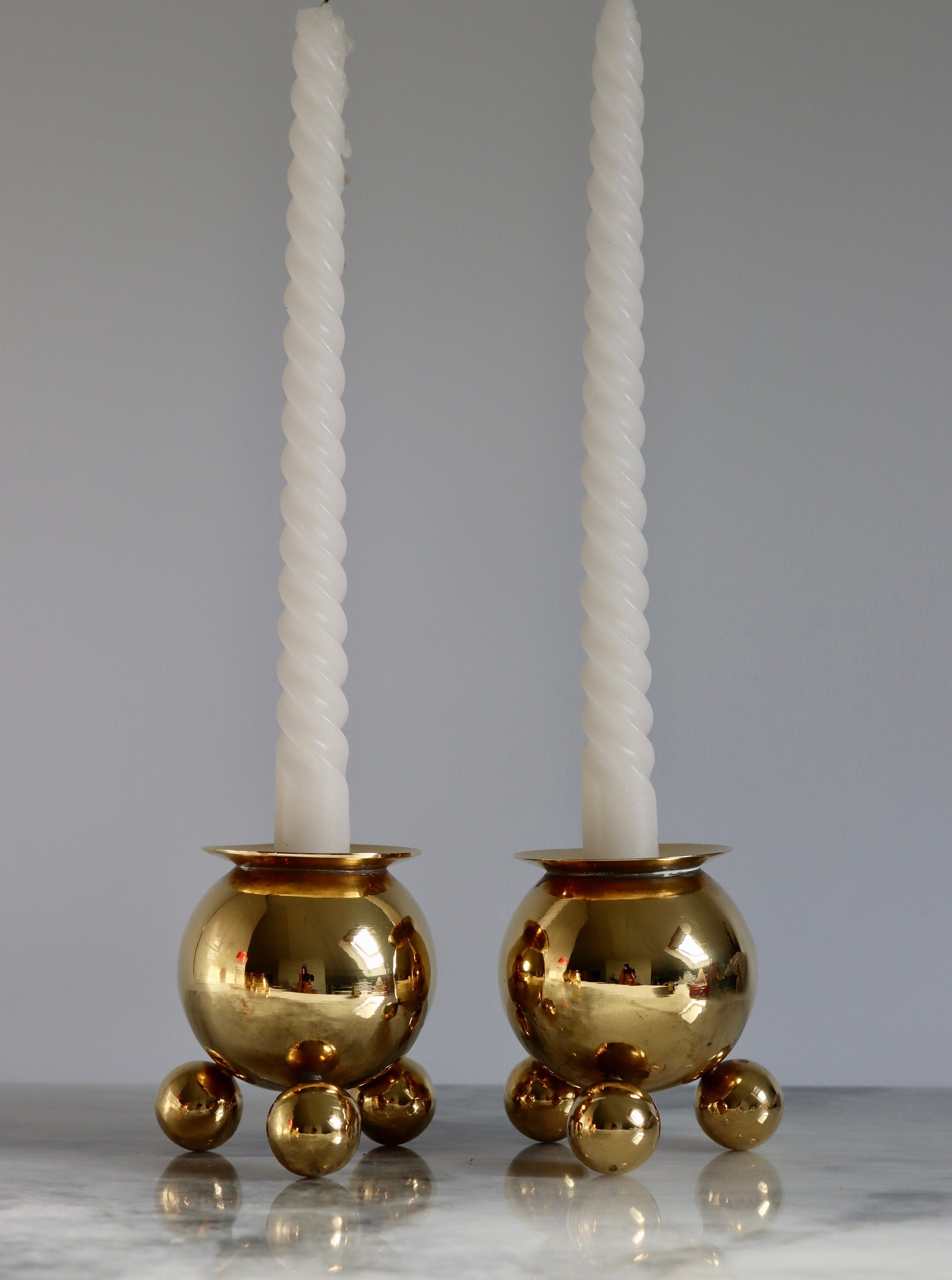 Pair of Mid-Century Swedish Brass Candle Holders Noah Ancienne