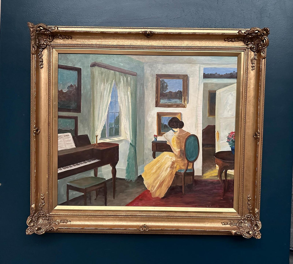 “Interior with Reading Woman” by V. Hansen