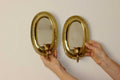 Pair of Mid Century Swedish Brass Sconces with Mirror