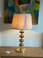 Tall Swedish Brass Bobbin lamps by Aneta