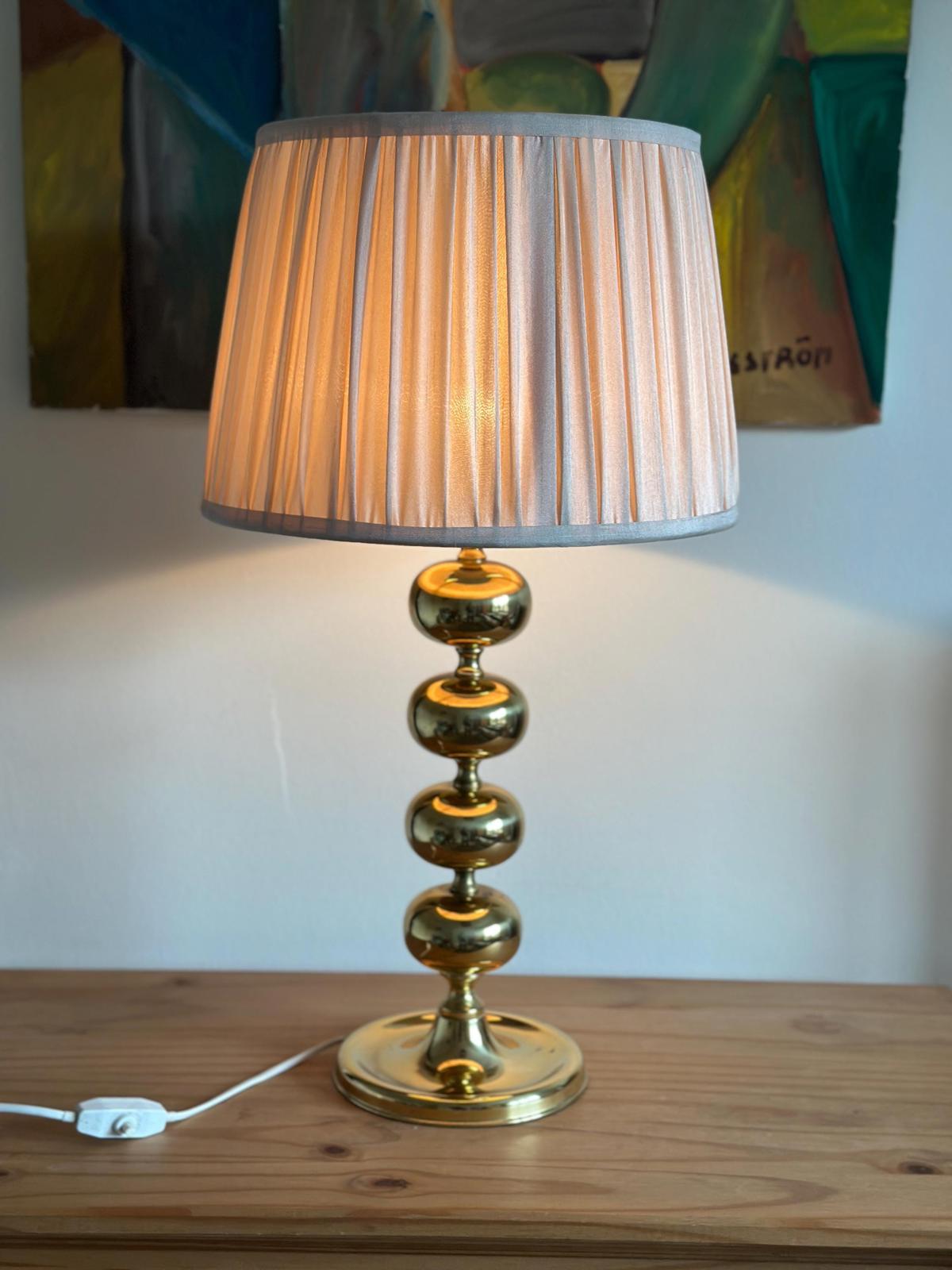 Tall Swedish Brass Bobbin lamps by Aneta