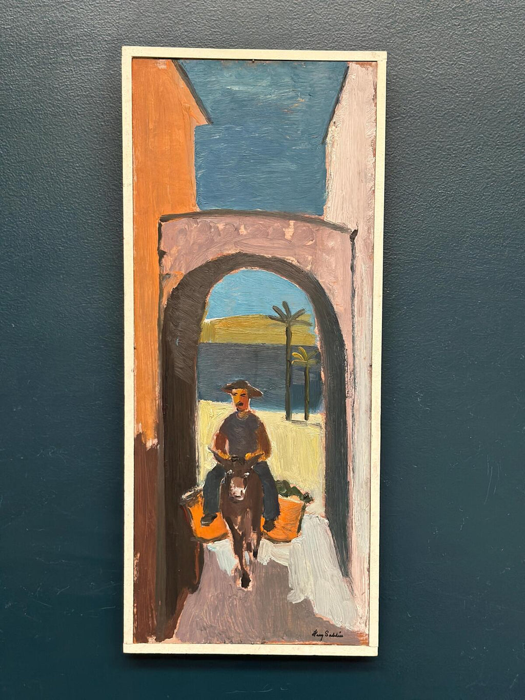 “Man Riding a Donkey” by Harry Sahlin