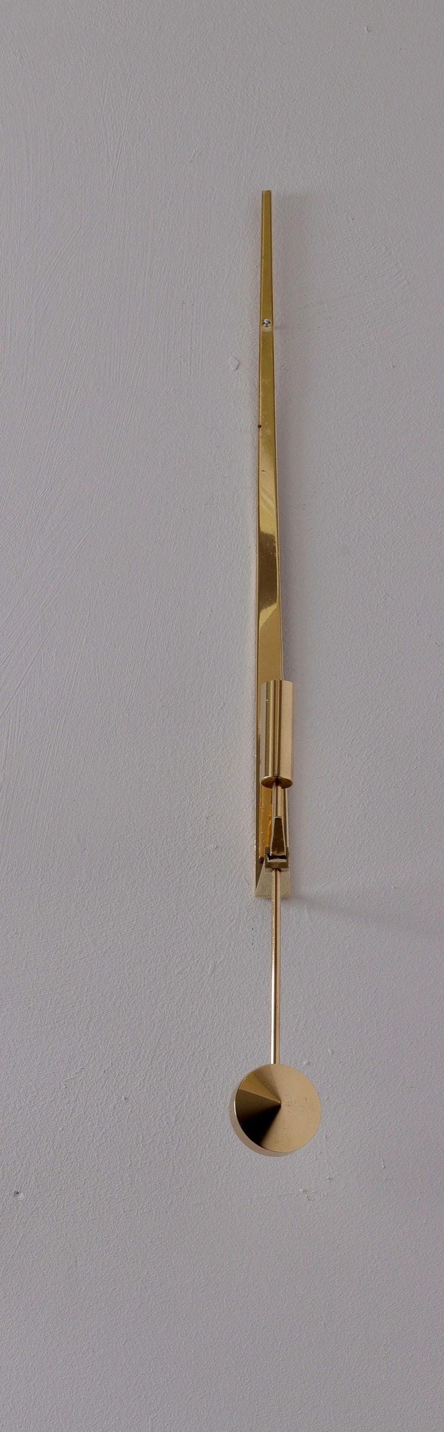 Pair of Swedish Brass sconces by Pierre Forsell for Skultuna " Pendeln"