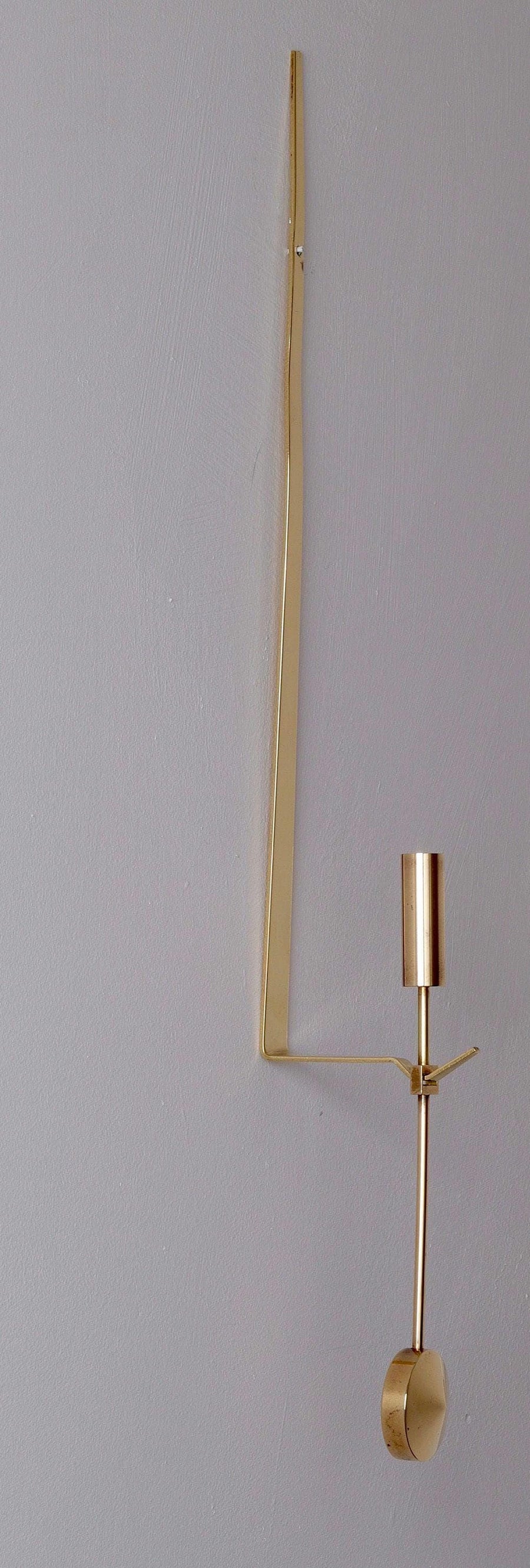 Pair of Swedish Brass sconces by Pierre Forsell for Skultuna " Pendeln"