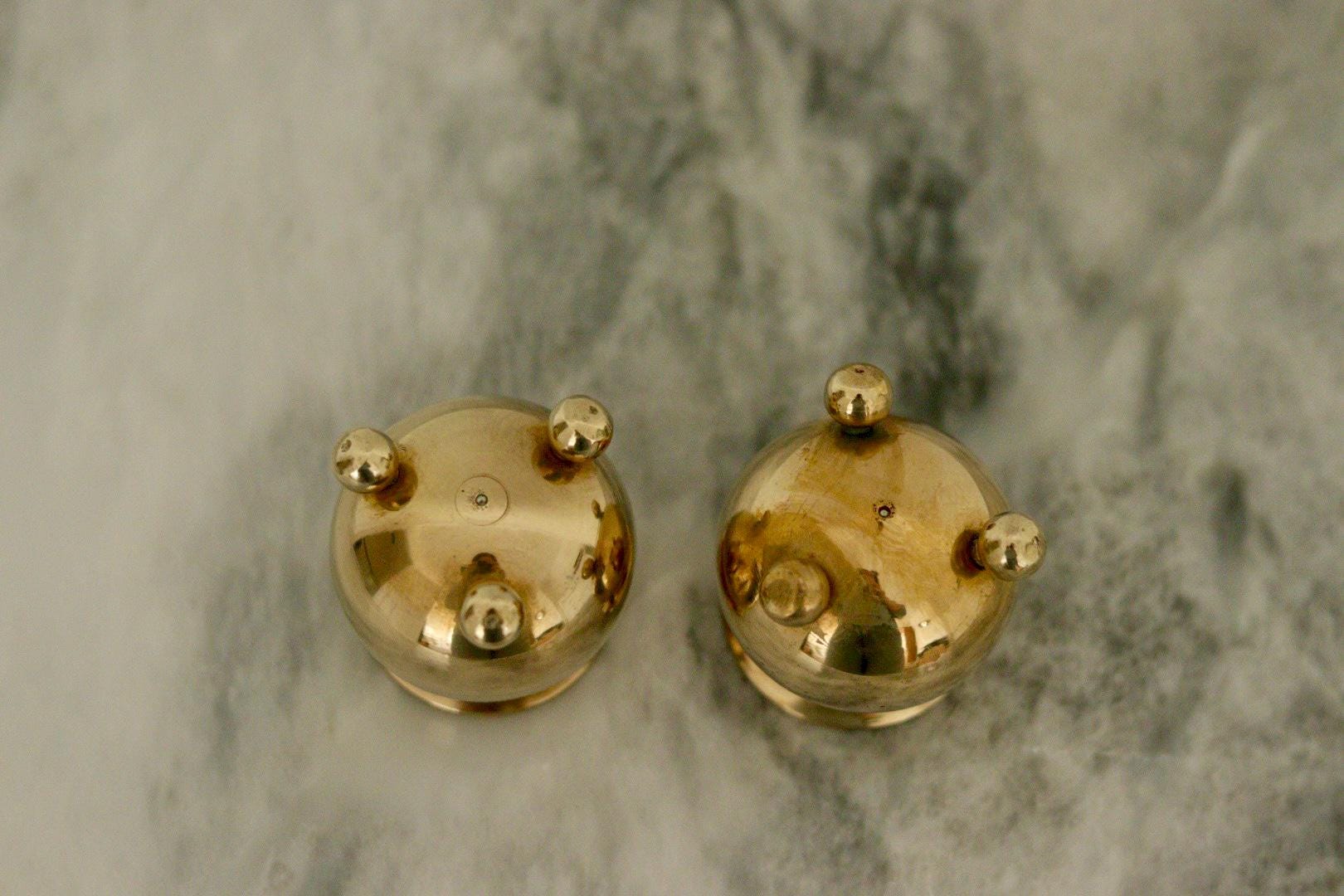 Pair of Mid-Century Swedish Brass Candle Holders