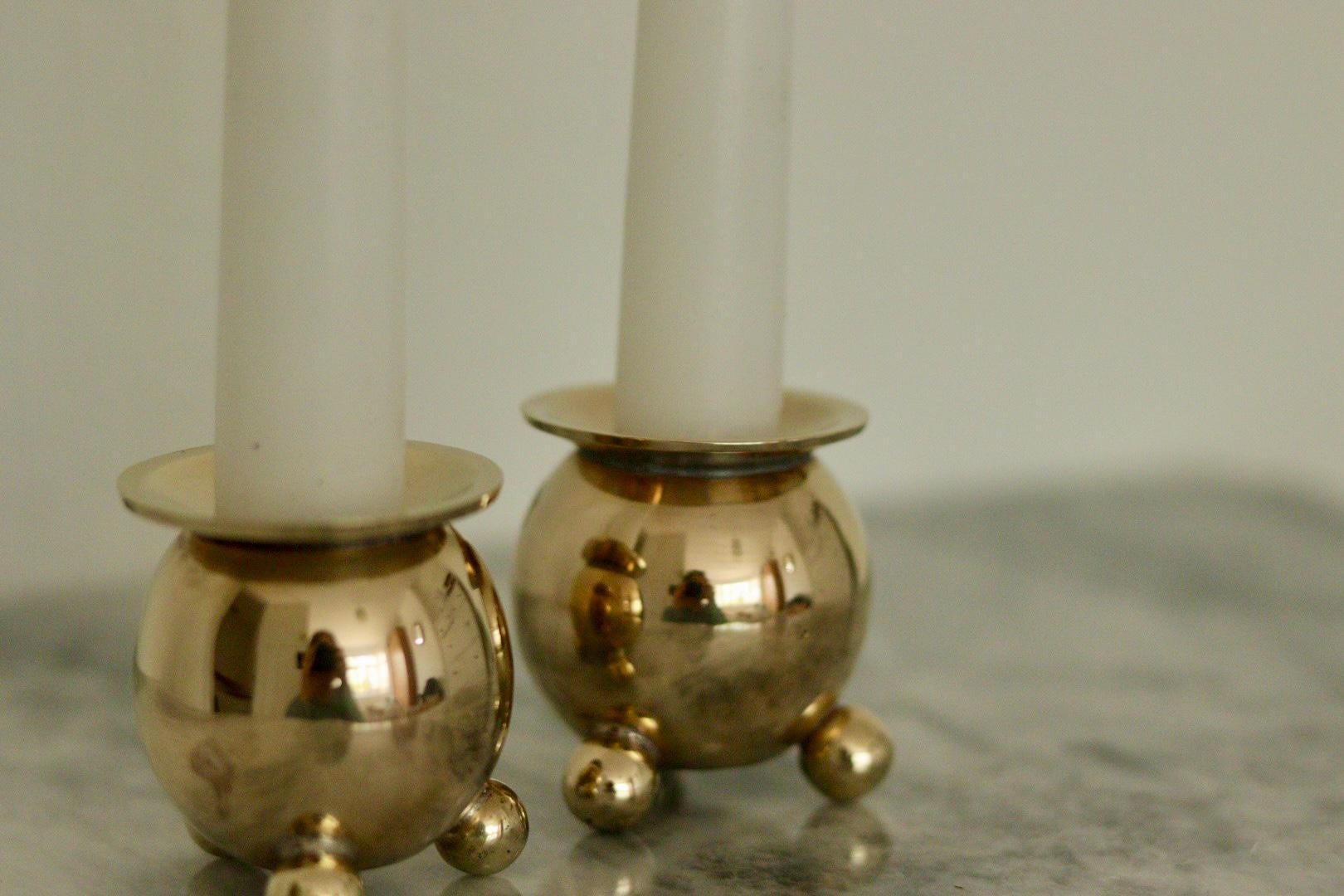 Pair of Mid-Century Swedish Brass Candle Holders