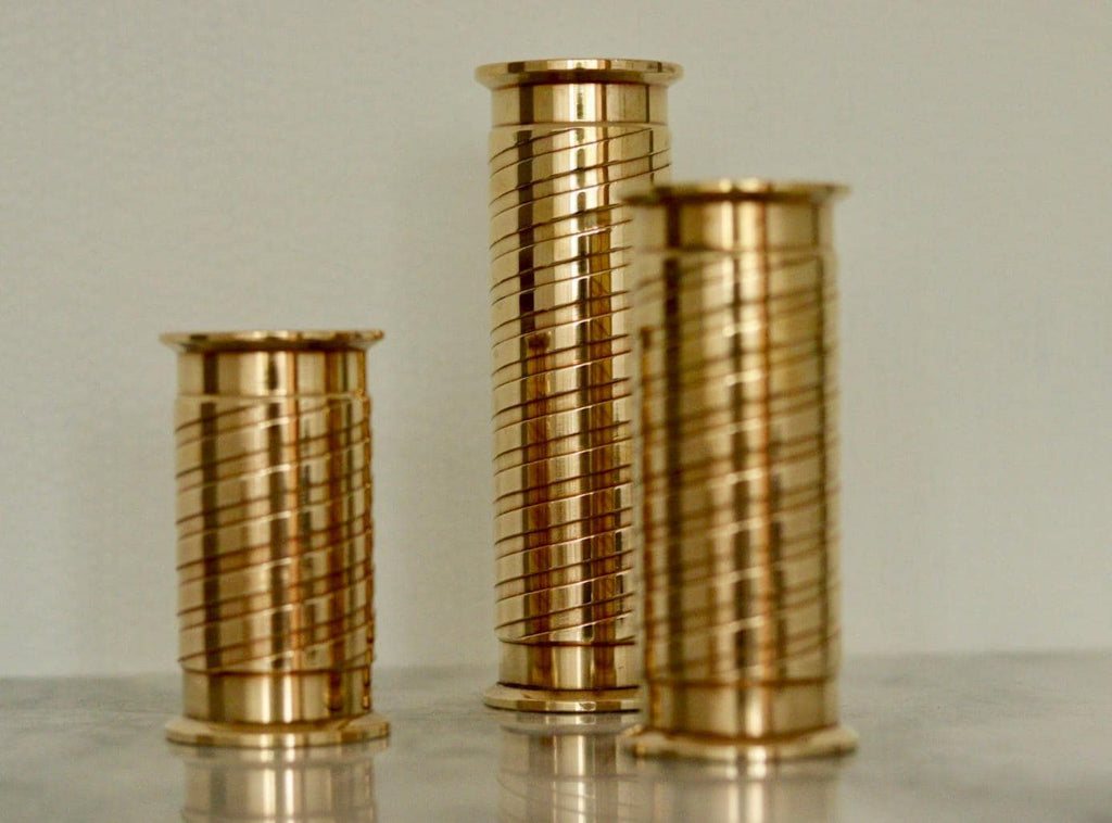 Trio of Mid-Century Swedish Brass Candle Holders