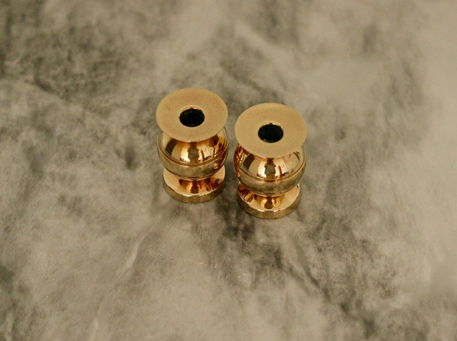 Pair of Mid-Century Swedish Brass Candle Holders