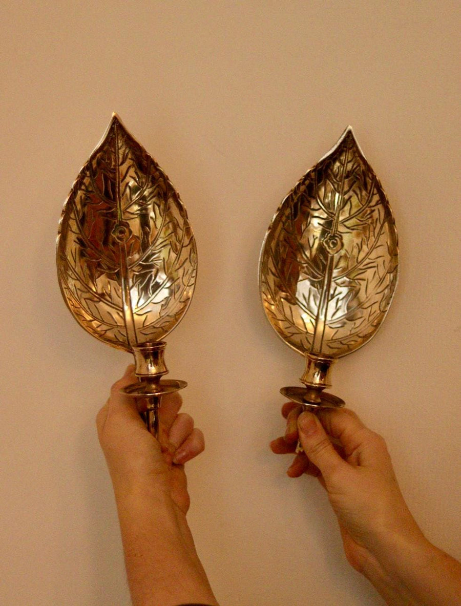 A Pair of Vintage Brass Sconces in Hammered Leaf Shape