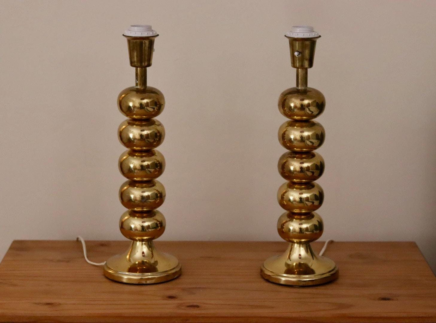 Pair of Tall Mid Century Swedish Brass Bobbin lamps by Aneta
