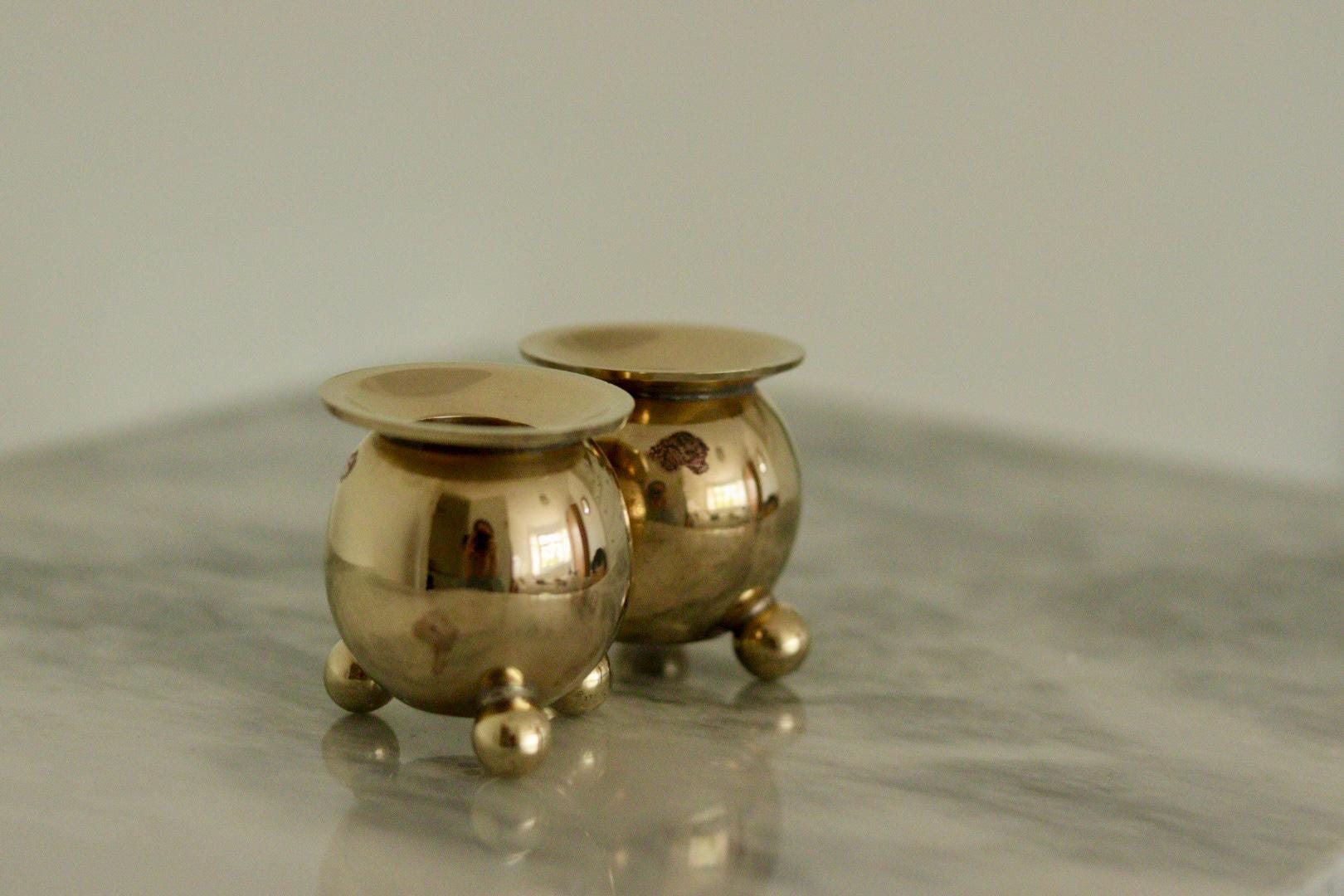 Pair of Mid-Century Swedish Brass Candle Holders