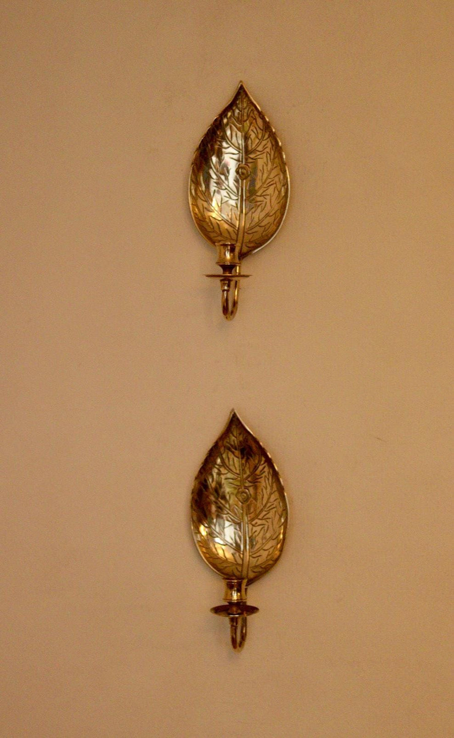 A Pair of Vintage Brass Sconces in Hammered Leaf Shape