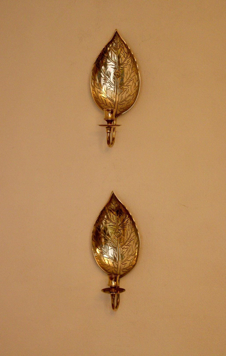 A Pair of Vintage Brass Sconces in Hammered Leaf Shape