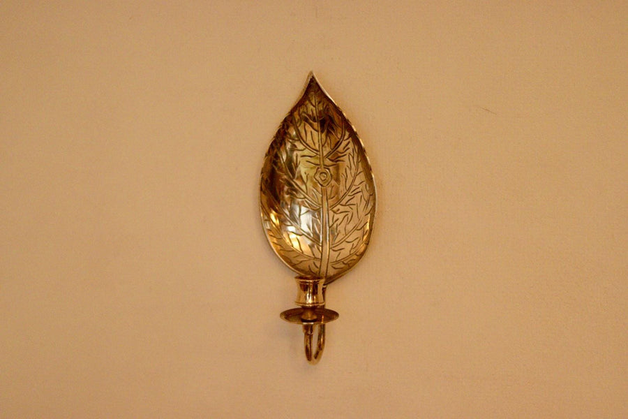 A Pair of Vintage Brass Sconces in Hammered Leaf Shape