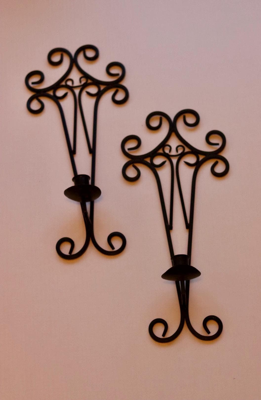 Pair of vintage black metal sconces