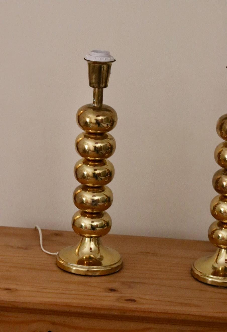 Pair of Tall Mid Century Swedish Brass Bobbin lamps by Aneta