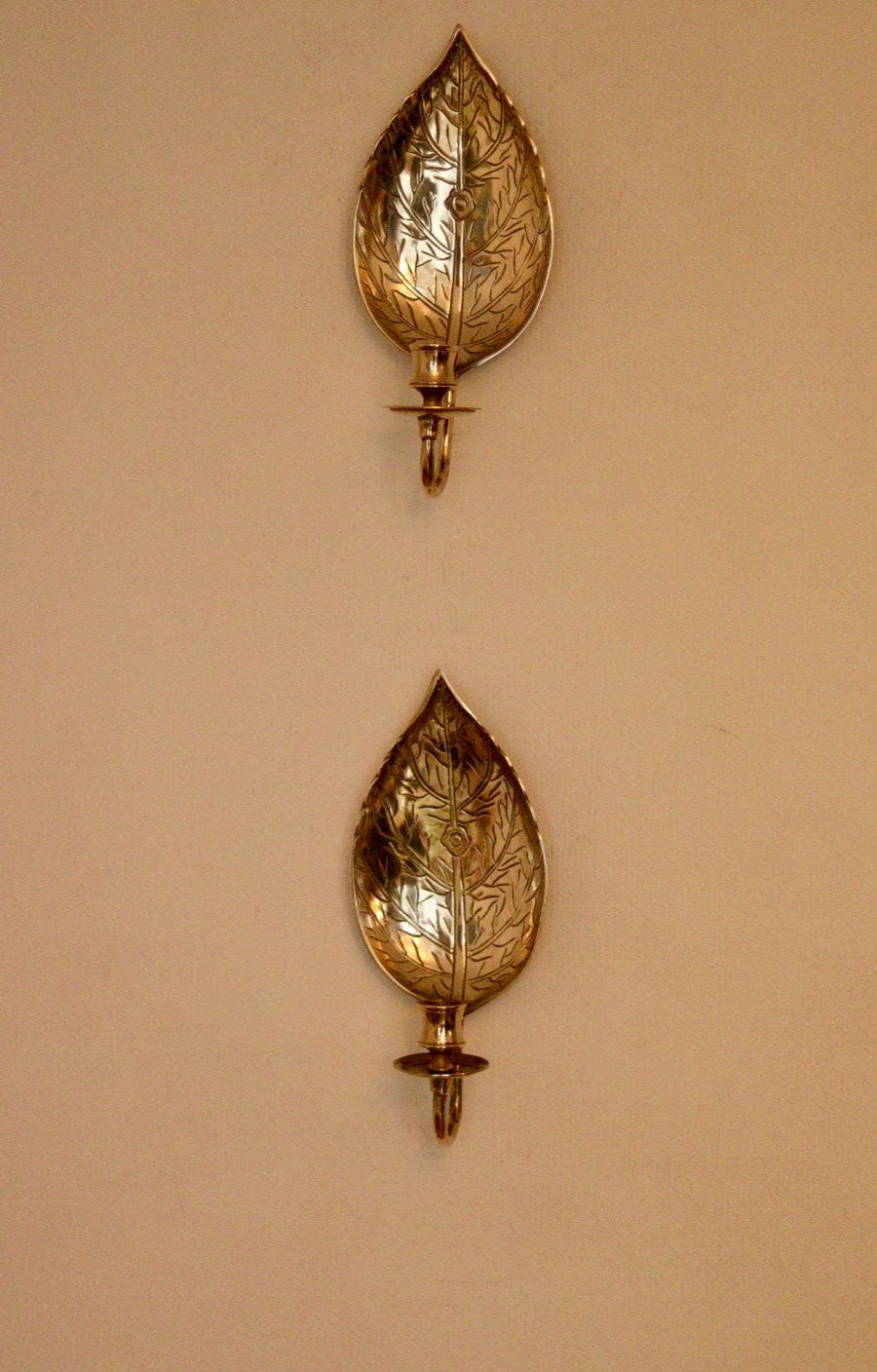 A Pair of Vintage Brass Sconces in Hammered Leaf Shape