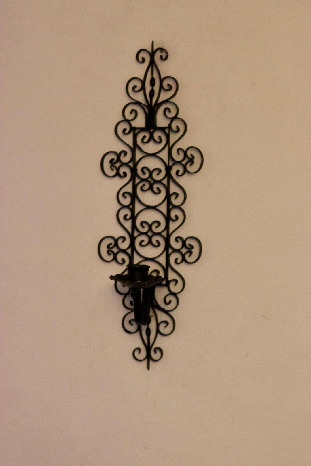 Pair of vintage black metal sconces