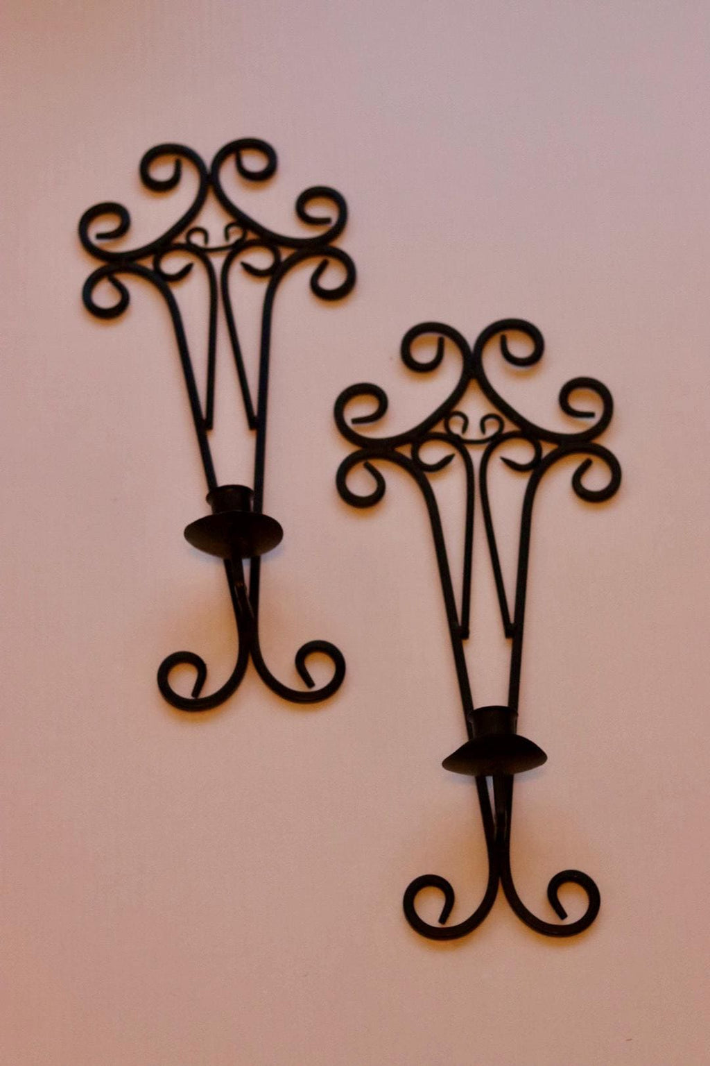 Pair of vintage black metal sconces