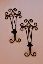 Pair of vintage black metal sconces