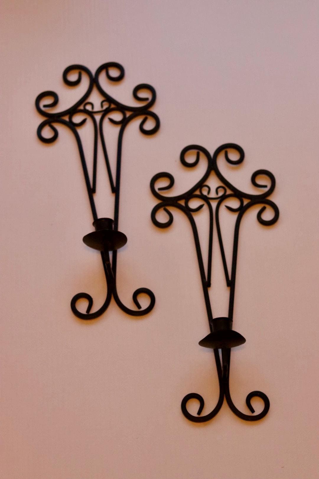 Pair of vintage black metal sconces