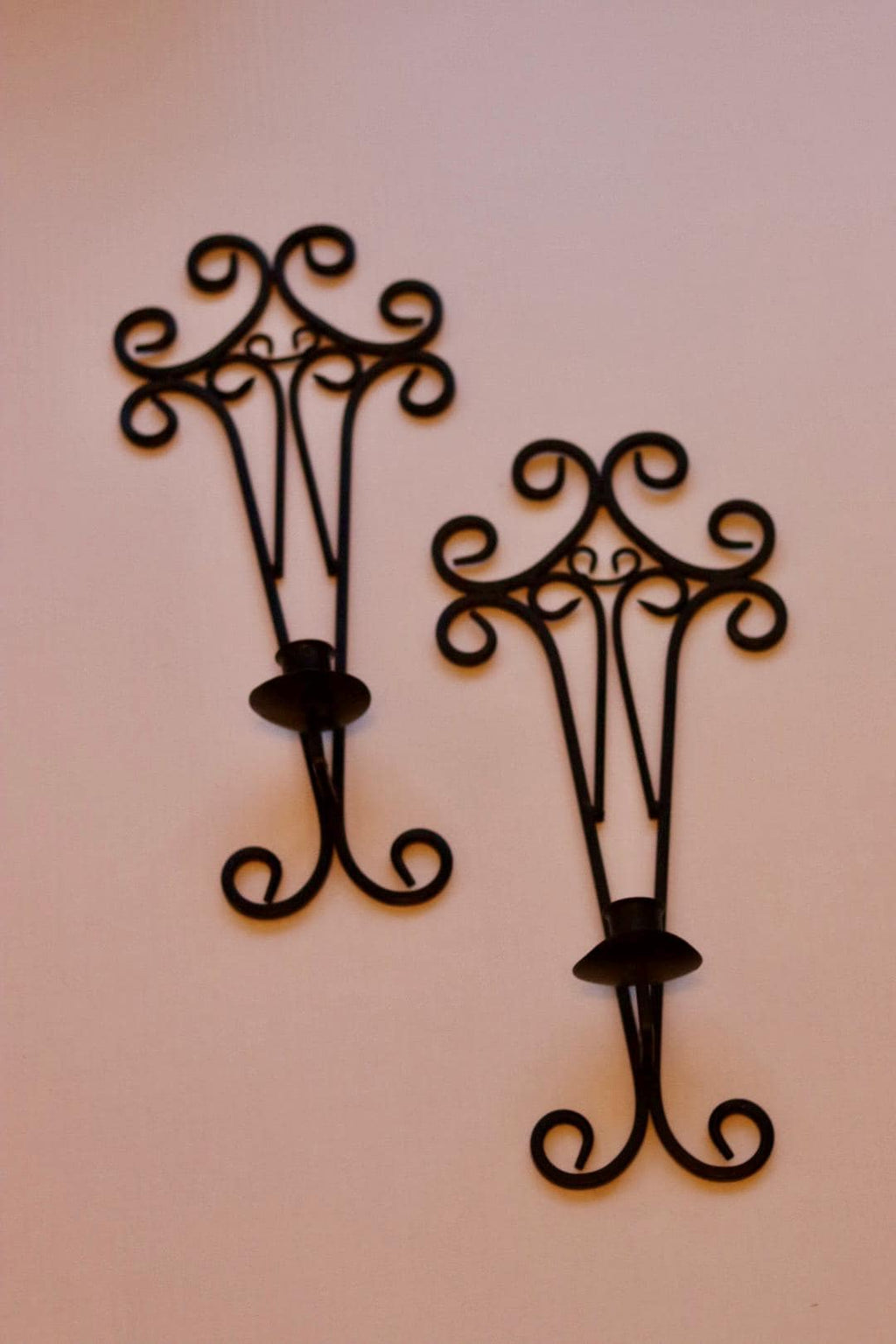 Pair of vintage black metal sconces