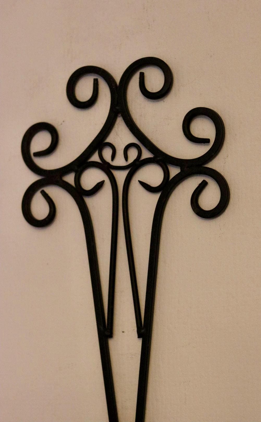 Pair of vintage black metal sconces