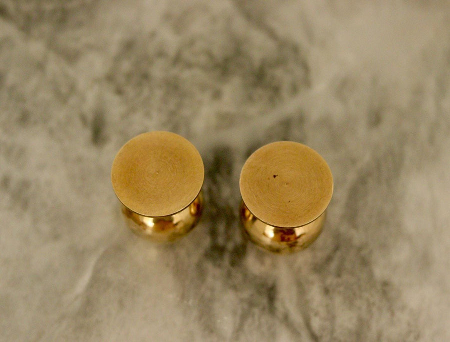 Pair of Mid-Century Swedish Brass Candle Holders