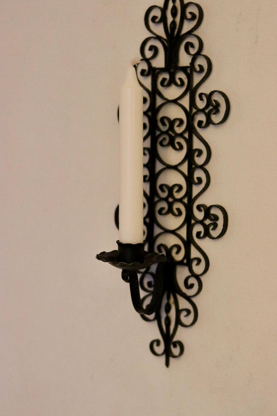 Pair of vintage black metal sconces